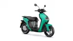 Teal Yamaha scooter with a black seat and mirrors, shown from the front-right side
