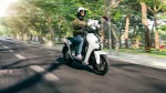 2023-yamaha-eje025-eu-milky_white-action-001-03-jpg.webp | q2moto