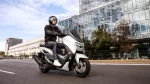 2023-yamaha-g125ym-eu-milky_white-action-001-03-jpg.webp | q2moto