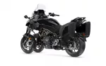 Black touring motorcycle with hard side cases and a tall windscreen, shown from a front-left angle.