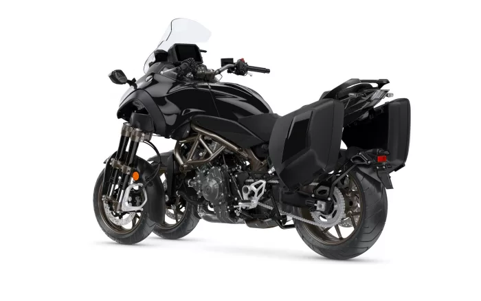 Black touring motorcycle with hard side cases and a tall windscreen, shown from a front-left angle.