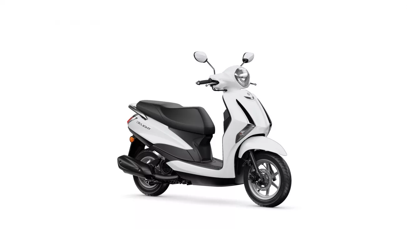 White scooter shown from a front-right angle with black seat and chrome mirrors against a white background