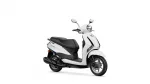 White scooter shown from a front-right angle with black seat and chrome mirrors against a white background
