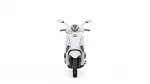 Front view of a white scooter facing the camera, showing headlight, mirrors, and front fender