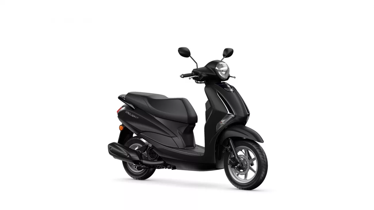 Black modern scooter photographed from a front-right angle, showing the headlight, mirrors, and two-wheeled body on a white backdrop.