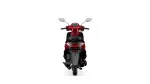 Rear-view of a red scooter with tail lights and seat against a white background