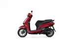 Red scooter in side profile against a white background, showing the front headlight and black seat.