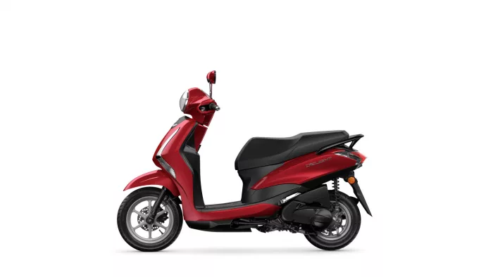 Red scooter in side profile against a white background, showing the front headlight and black seat.