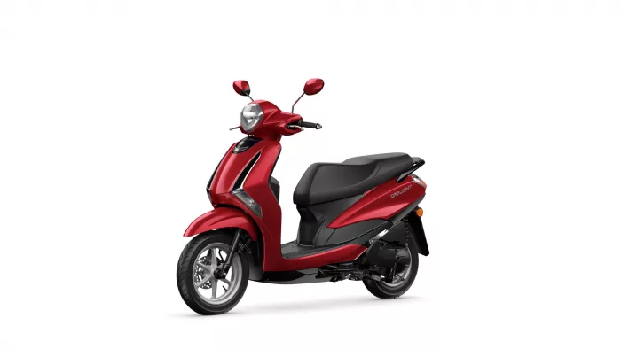 Red scooter with black seat shown in a three-quarter front view, headlight centered and mirrors visible.