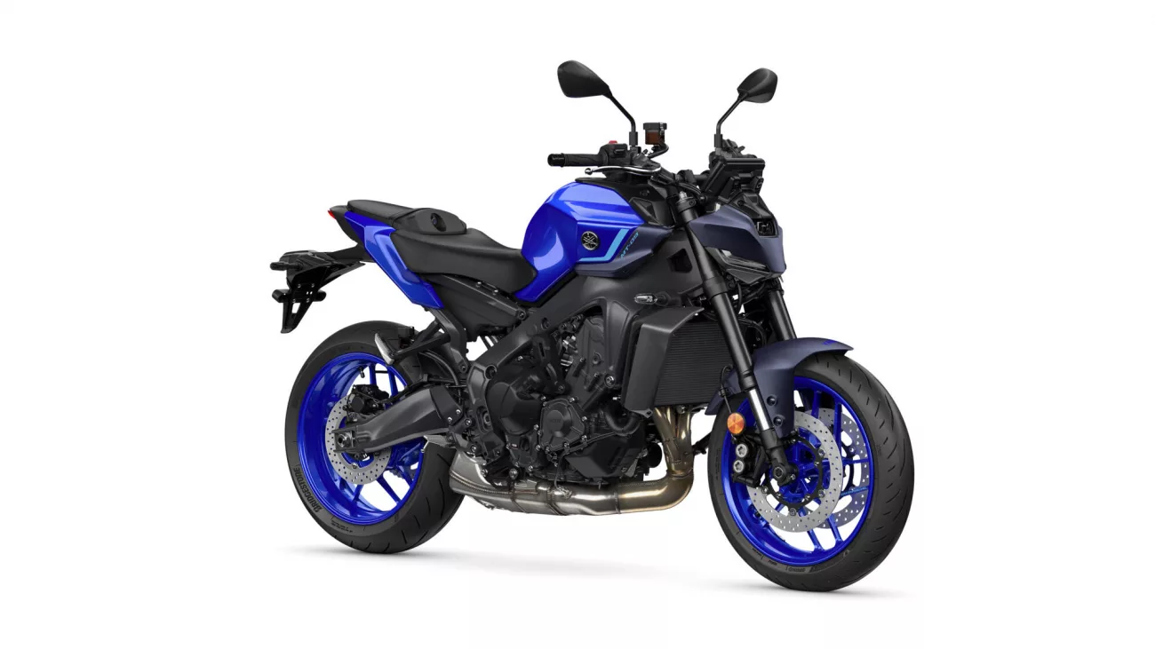 Blue sport motorcycle shown from a left-front side angle, exposing the engine and blue rims