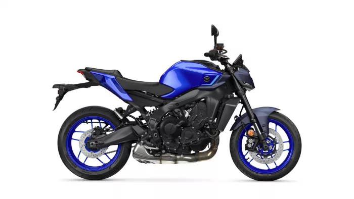 Blue sport motorcycle shown in a left-side profile with blue bodywork, black frame, and blue rims, against a white background.