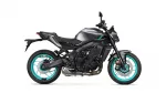 Modern sport motorcycle in grey/black with teal rims, side view