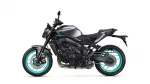 Sport motorcycle in metallic gray with teal accents and turquoise wheels, shown from the left side.