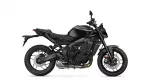 Black sport motorcycle shown in a left-side profile, highlighting the engine, exhaust, and disc brakes against a white background