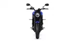 Front view of a blue Yamaha motorcycle against a white background, facing the viewer with a round headlight.