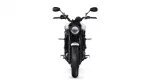 Front view of a Yamaha motorcycle facing the camera, with a large round headlight centered and black mirrors above the handlebars.
