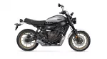 Side view of a Yamaha XSR 700 motorcycle with a silver fuel tank and black frame, shown in profile on a white background.