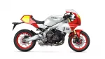 Side view of a Yamaha XSR900 GP sport motorcycle in white with red accents and red wheels on a white background with a prominent yellow-tinted windscreen area.
