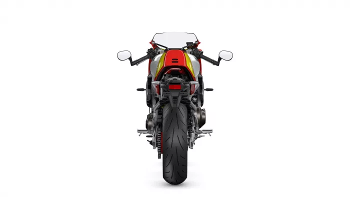 Rear view of a colorful sport motorcycle with red fairing and white windscreen on a white background.