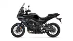 Side view of a black Yamaha sport-touring motorcycle with a tall windshield and exposed engine components