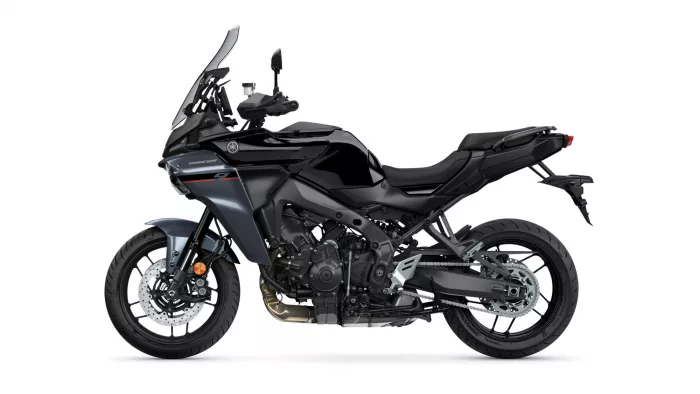 Side view of a black Yamaha sport-touring motorcycle with a tall windshield and exposed engine components