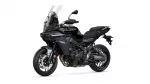 Black Yamaha Tracer sport-touring motorcycle shown from a front-right angle with tall windshield and dual headlights