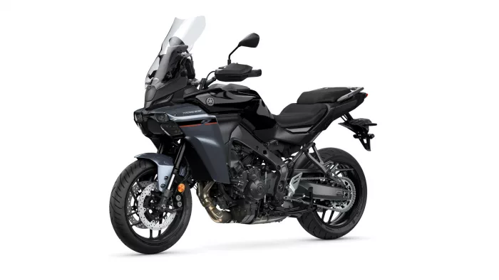 Black Yamaha Tracer sport-touring motorcycle shown from a front-right angle with tall windshield and dual headlights