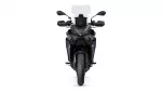Front view of a dark gray adventure motorcycle with a tall windshield, dual headlights, and side mirrors