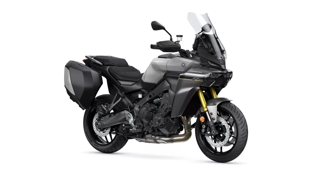 Gray Yamaha Tracer 9 GT sport-touring motorcycle with black side cases and a tall windshield