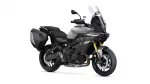 Gray Yamaha Tracer 9 GT sport-touring motorcycle with black side cases and a tall windshield