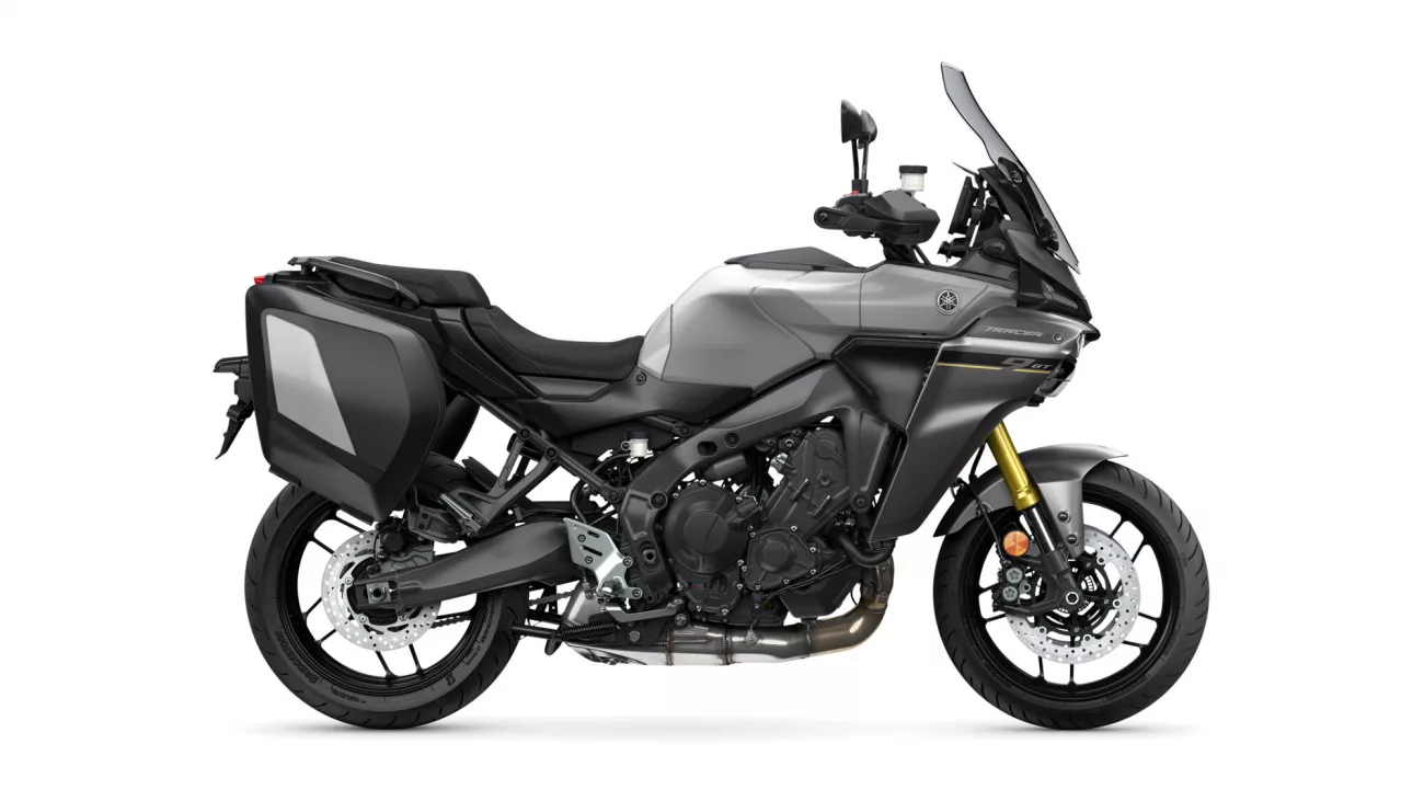 Grey Yamaha Tracer sport-touring motorcycle with side panniers and tall windshield on a white background.