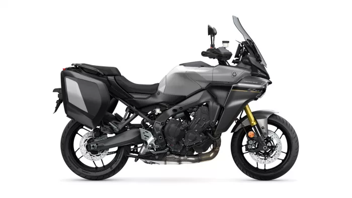Grey Yamaha Tracer sport-touring motorcycle with side panniers and tall windshield on a white background.