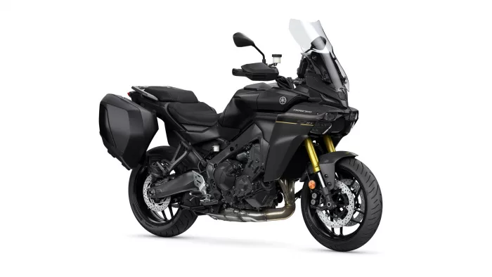 Black Yamaha Tracer 9 GT sport-touring motorcycle with integrated side panniers and a tall windscreen