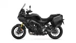 Yamaha Tracer GT sport touring motorcycle with integrated side panniers, shown in profile on black finish and gold front suspension.