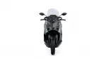 Front view of a modern sport motorcycle with a tall windshield and side mirrors.