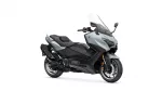 Gray and black Yamaha sport motorcycle with a tall clear windshield and exposed engine details