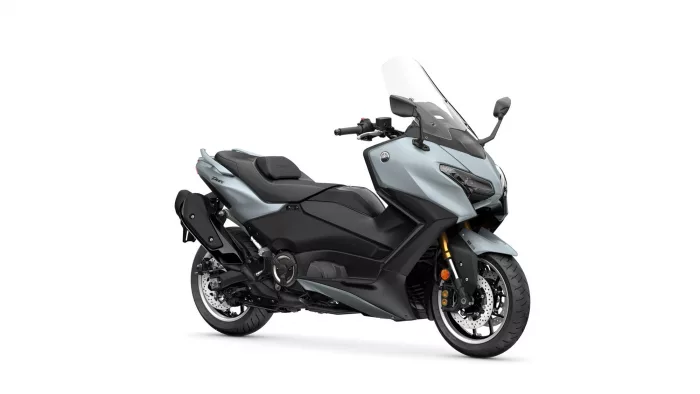 Gray and black Yamaha sport motorcycle with a tall clear windshield and exposed engine details