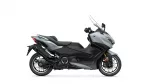 Gray and black sport motorcycle shown in profile view with a tall windshield and exposed front fairing (left-side perspective).
