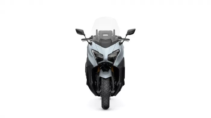 Front view of a modern sport motorcycle with a clear windshield and dual headlights.