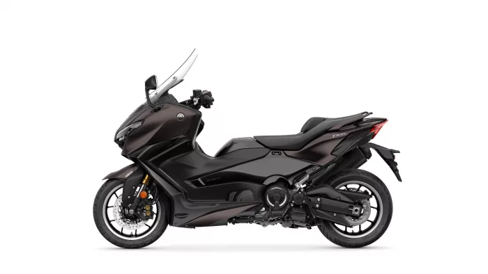 Black Yamaha Tmax sport scooter shown in profile against a white background.