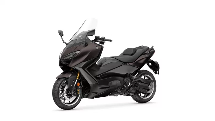 Dark burgundy Yamaha sport-tourer motorcycle shown from a front-left angle with a tall windshield and visible dual discs on the front wheel.