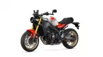Sport motorcycle shown from front-left, white body with red accents and gold front forks (Yamaha XSR 900).2D6
