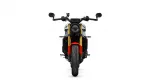 Front view of a modern motorcycle with a round headlight, gold front forks, and red fender.