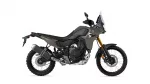 Side view of a Yamaha Tenere 700 adventure motorcycle with beige bodywork, black frame, and gold front forks.