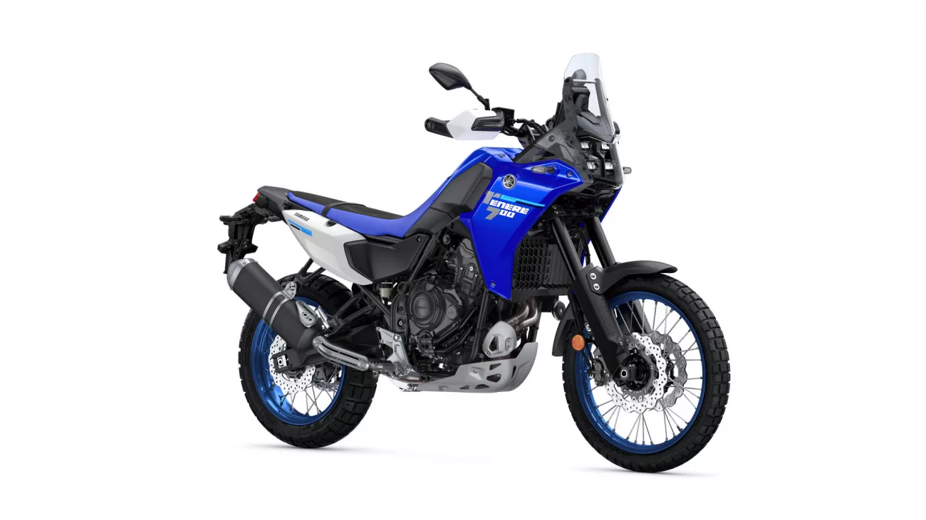Blue Yamaha adventure motorcycle shown from a side-front angle with a tall windshield and knobby tires