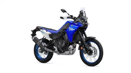 Blue Yamaha adventure motorcycle shown from a side-front angle with a tall windshield and knobby tires
