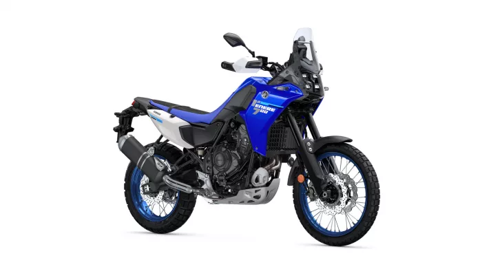Blue Yamaha adventure motorcycle shown from a side-front angle with a tall windshield and knobby tires