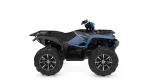 Blue and black Yamaha Grizzly ATV with large off-road tires and front/rear racks, side view