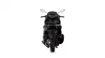 Rear view of a black sport motorcycle against a white background, showing taillights and rear wheel.