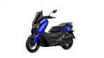 Blue Yamaha scooter shown from the front-left with windshield and black seat for a product view.